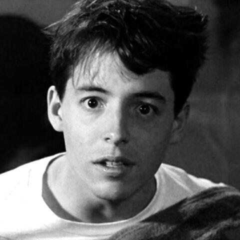 a black and white photo of ferris bueller from ferris bueller's day off looking head on.