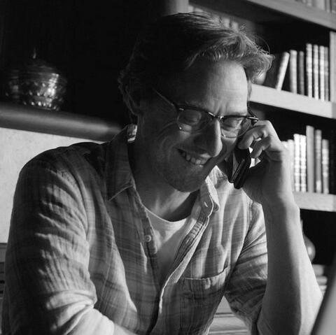 a black and white photo of bill denbrough from it: chapter 2 looking right.